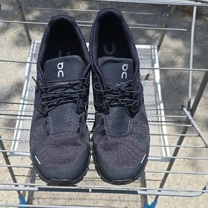 On Running Black Athletic Shoes with CloudTec